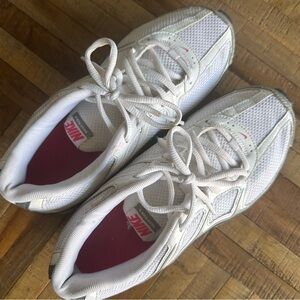 Pink and white Nike sneakers, great condition.